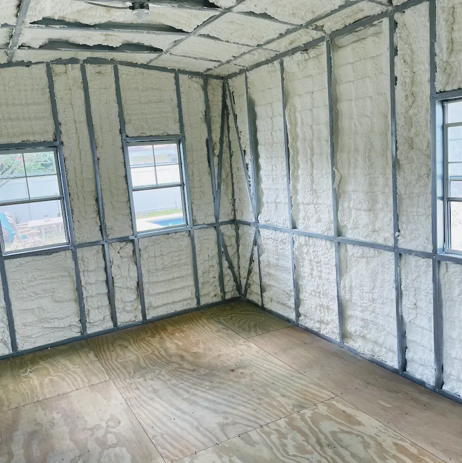 Closed-cell spray foam insulation applied to wall cavities in a residential project in Hackensack